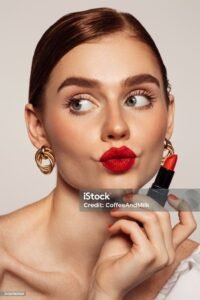 applying lipstick